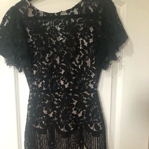 Black Lace Dress. Nude lining beneath sheer lace with sheer eyelash lace hem.